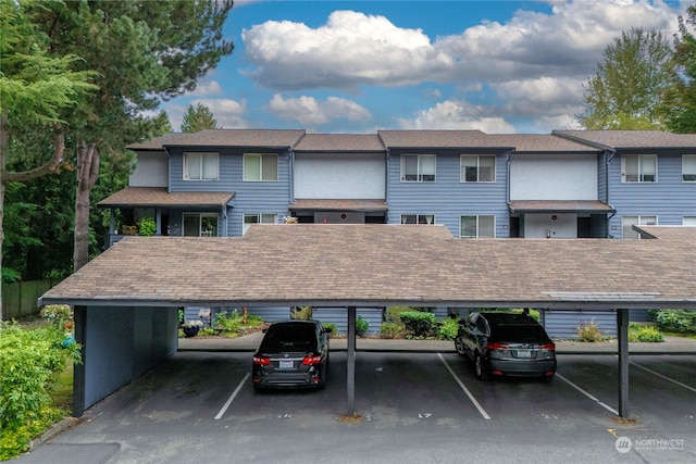 exterior space featuring a carport