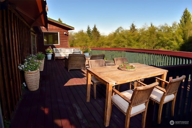 deck with an outdoor hangout area