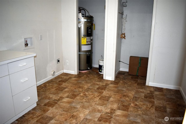 washroom featuring hookup for an electric dryer, hookup for a washing machine, and water heater