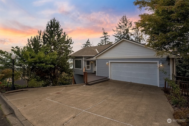 view of front of property with a garage