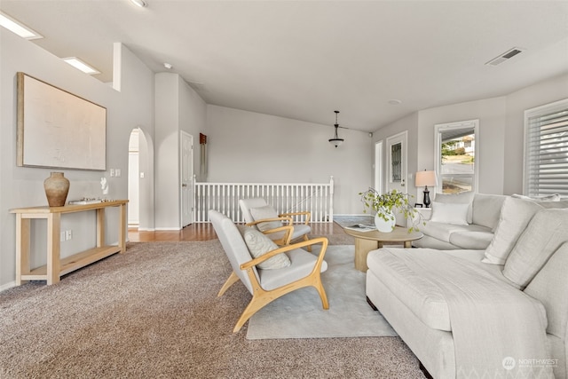 living room with light colored carpet