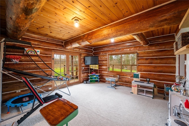 miscellaneous room with wood ceiling, log walls, and a healthy amount of sunlight