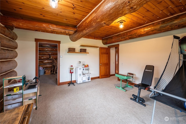 exercise area with wooden ceiling and carpet floors