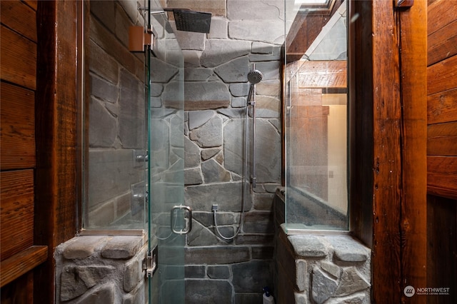 bathroom featuring an enclosed shower