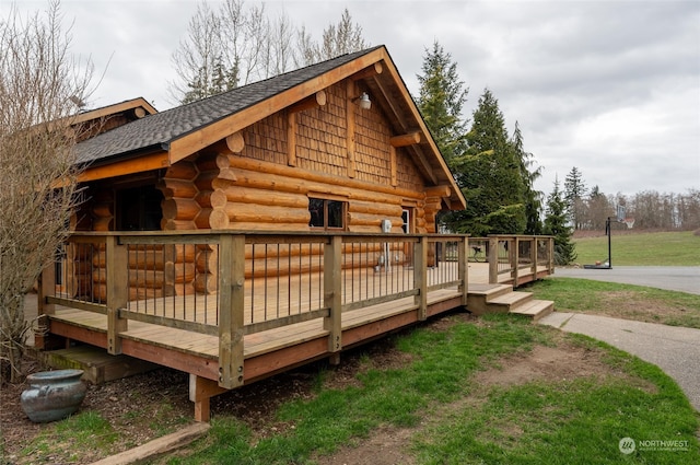 exterior space with a wooden deck