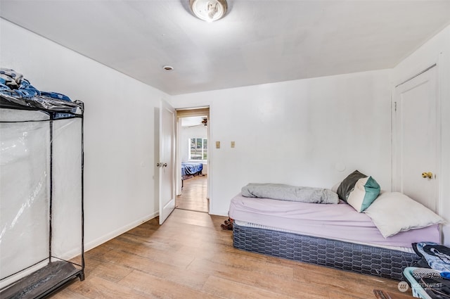 bedroom with light hardwood / wood-style flooring