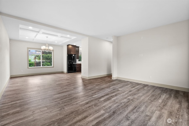 120 E 52nd St, Tacoma, WA 98404 - unfurnished living room with coffered ceiling, hardwood / wood-style floors, and a notable chandelier