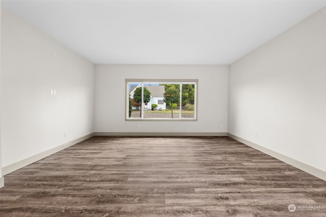 120 E 52nd St, Tacoma, WA 98404 - spare room featuring hardwood / wood-style floors