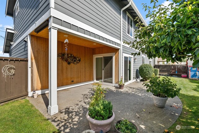 120 E 52nd St, Tacoma, WA 98404 - rear view of property with a yard and a patio