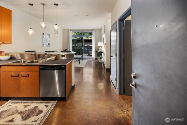 kitchen with decorative light fixtures, sink, stainless steel counters, and stainless steel dishwasher