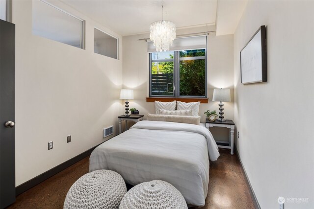 bedroom with a chandelier