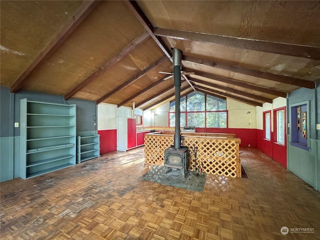 344 Dungeness Mdws, Sequim, WA 98382 - interior space featuring a wood stove and a ceiling fan