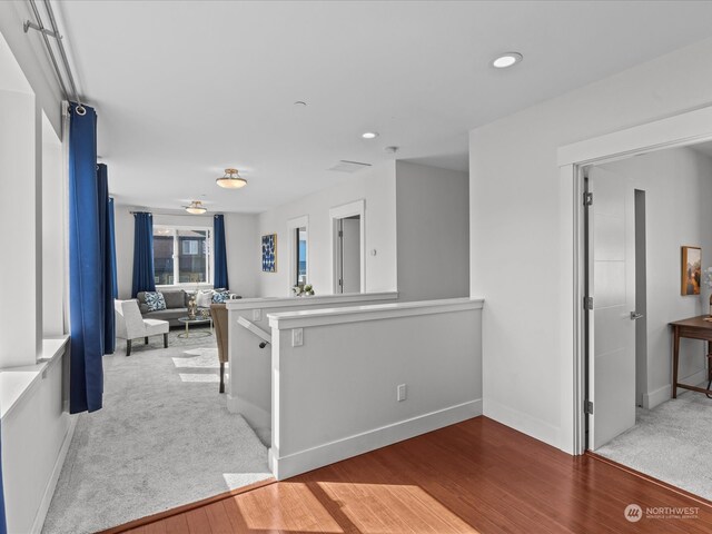 hallway with light wood-type flooring