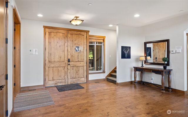 foyer entrance featuring light hardwood / wood-style flooring