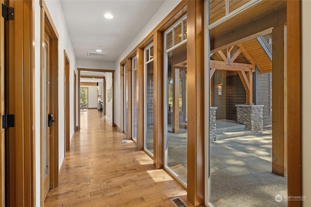 corridor featuring light hardwood / wood-style flooring