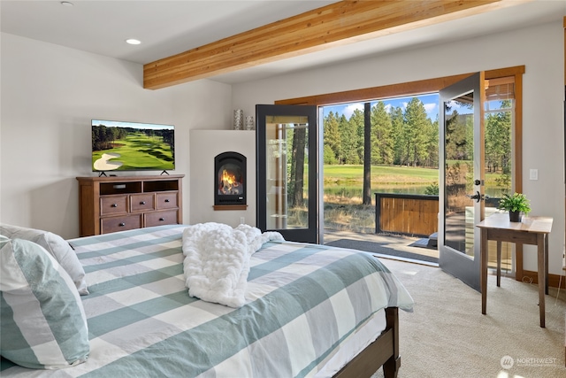 bedroom featuring access to outside, light carpet, beamed ceiling, and french doors