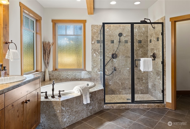 bathroom featuring independent shower and bath, tile patterned flooring, and vanity