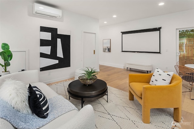 interior space with a wall mounted air conditioner and light wood-type flooring