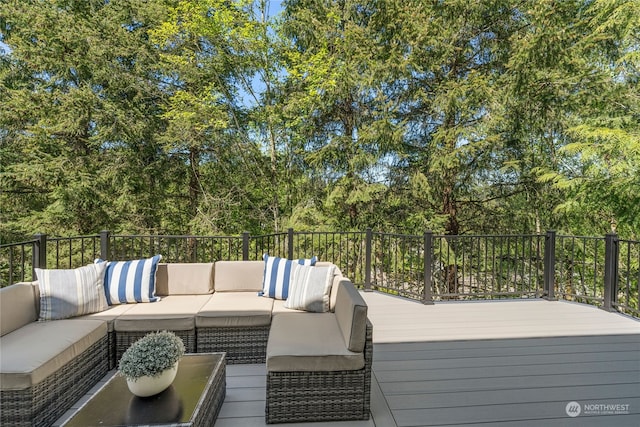 wooden deck featuring an outdoor living space