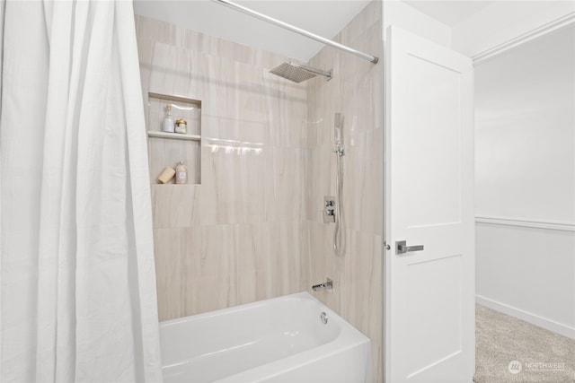 bathroom featuring shower / tub combo with curtain