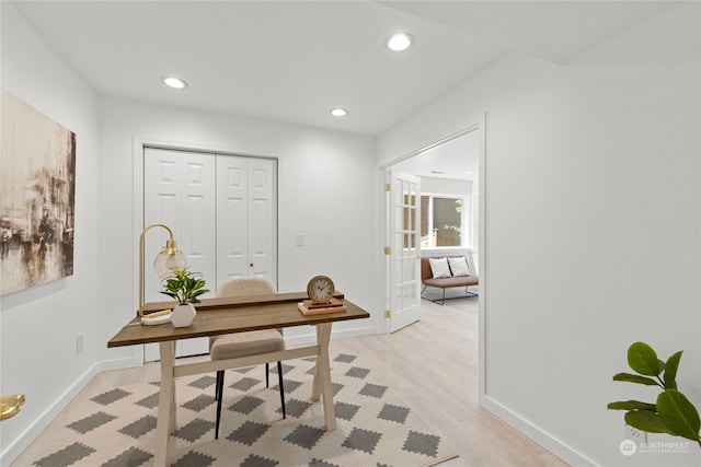 office space with light hardwood / wood-style floors