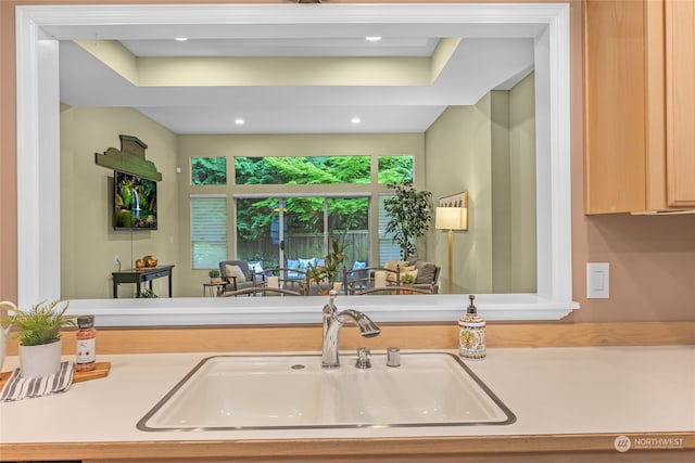 kitchen featuring sink and light brown cabinets