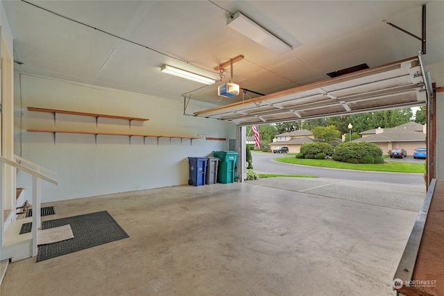 garage featuring a garage door opener