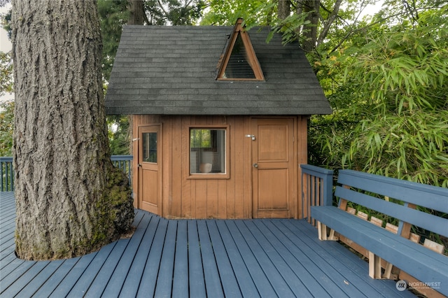 deck featuring an outbuilding