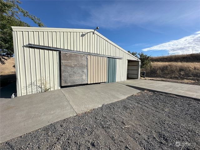 view of outdoor structure with a garage