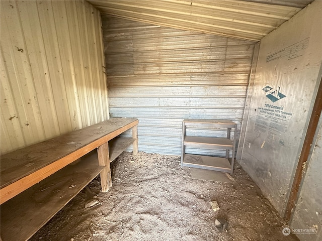 view of sauna with wood walls