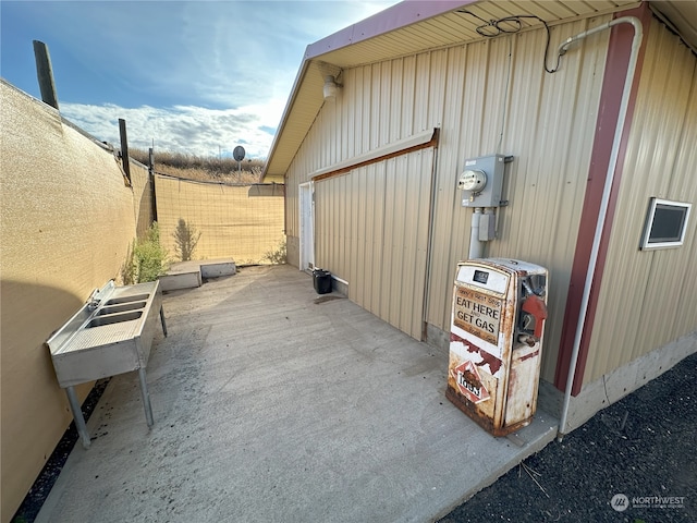 view of property exterior featuring a patio area