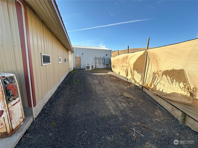 view of home's exterior with ac unit