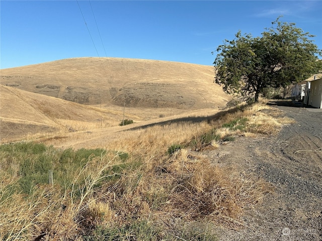 exterior space with a rural view