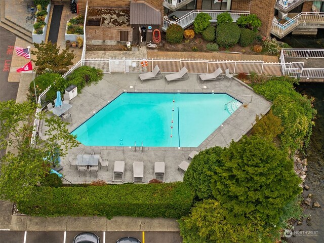 view of pool featuring central AC and a patio area