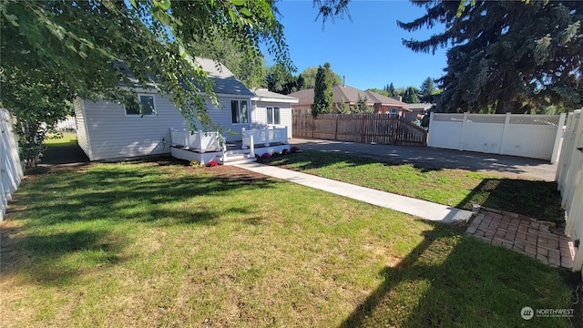 view of yard with cooling unit and a patio