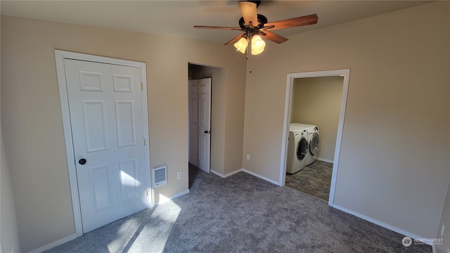 unfurnished bedroom with a closet, ceiling fan, carpet floors, and washer and dryer