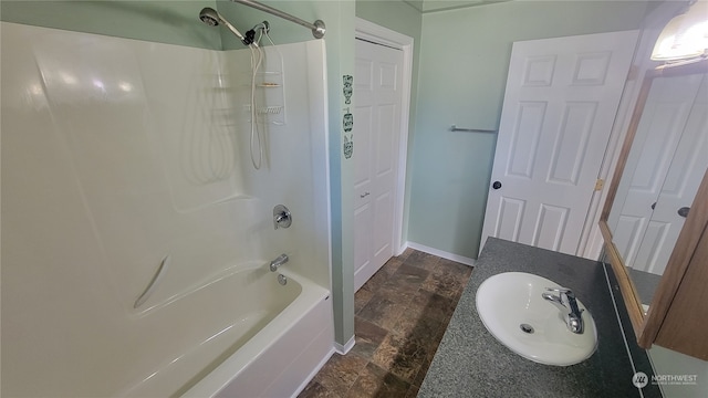 bathroom with bathing tub / shower combination and vanity