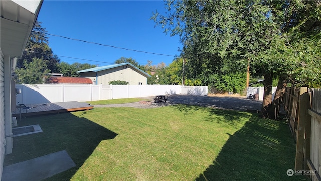 view of yard with a wooden deck