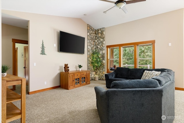 living room featuring ceiling fan, vaulted ceiling, and carpet