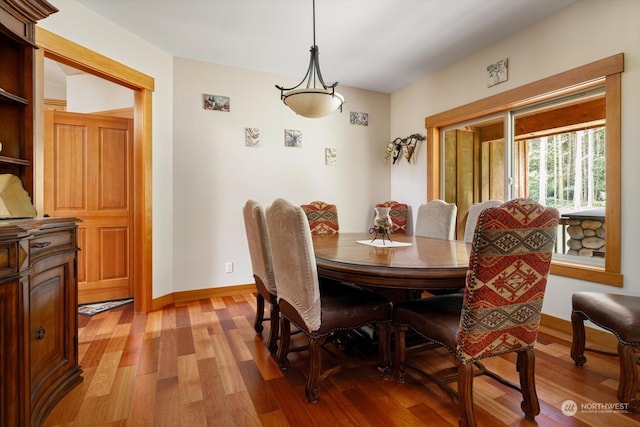 dining space featuring light hardwood / wood-style floors