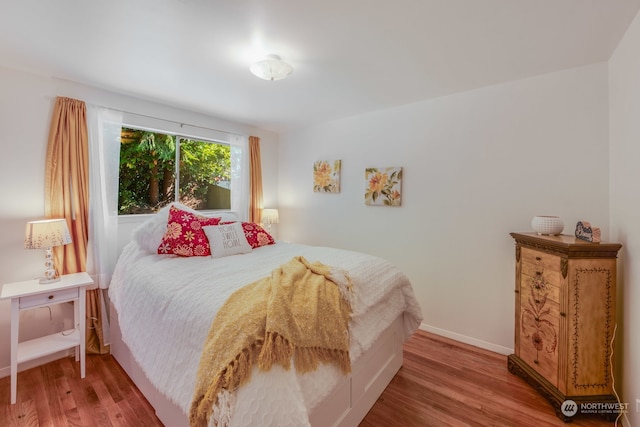 bedroom featuring hardwood / wood-style floors