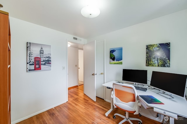 office area with light wood-type flooring