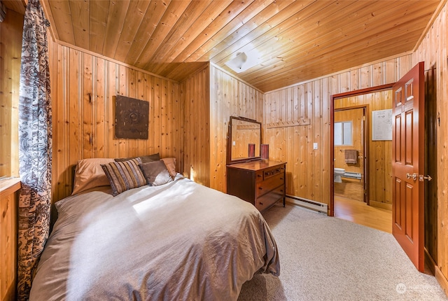 carpeted bedroom with wooden ceiling, wood walls, and a baseboard heating unit