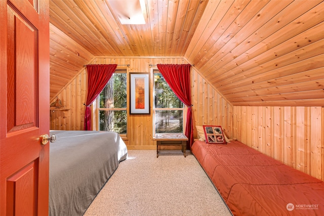 bedroom featuring wooden walls, wood ceiling, and lofted ceiling