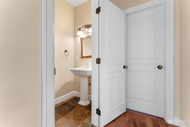 bathroom featuring wood-type flooring