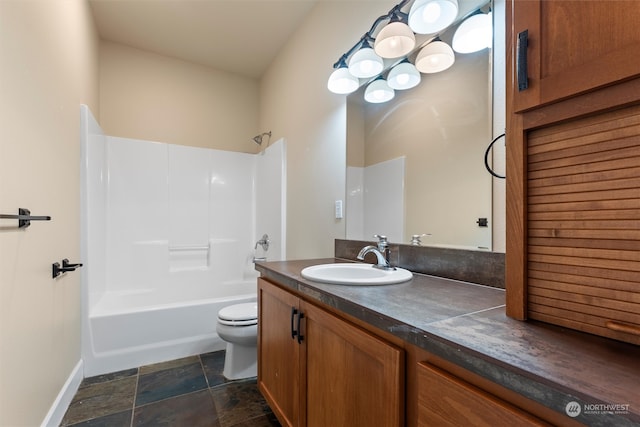 full bathroom featuring shower / tub combination, vanity, and toilet