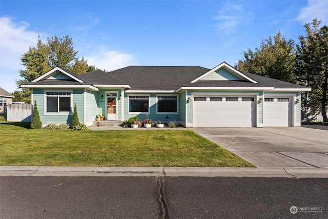 ranch-style house with a front yard and a garage