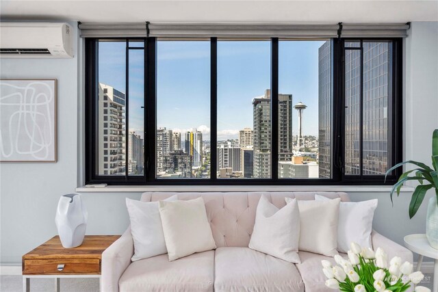 living room featuring an AC wall unit