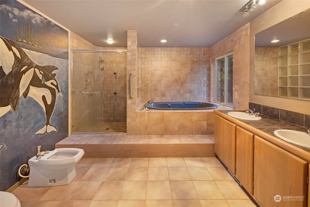 full bathroom featuring vanity, separate shower and tub, a bidet, and tile patterned flooring