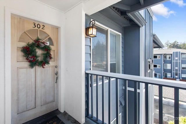 property entrance with a balcony